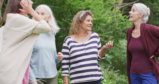 Group of Mature Women Socializing Outdoors in Park - Download Free Stock Images Pikwizard.com