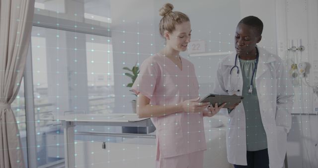 Medical Professionals Analyzing Patient Data on Tablet in Hospital - Download Free Stock Images Pikwizard.com