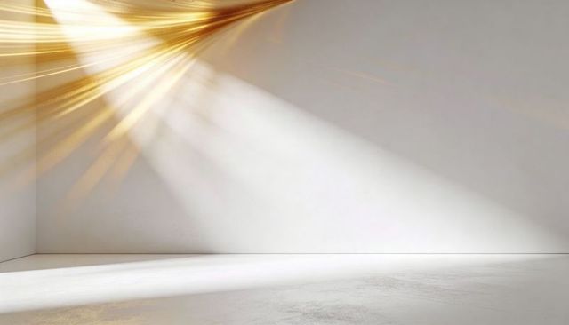 Minimalist white corner with golden sunbeams casting diagonal light and soft shadows in modern studi