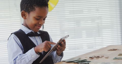 Young Business Executive Kid Using Tablet in Office