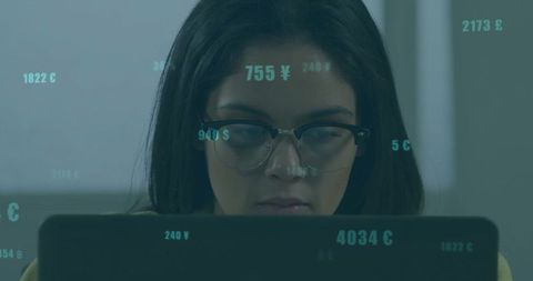 Concentrated Woman Analysing Digital Financial Data on Laptop