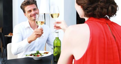 Couple Enjoying a Romantic Lunch at Elegant Restaurant - Download Free Stock Images Pikwizard.com