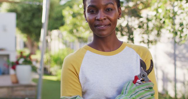 Smiling African American Woman Gardening Outdoors - Download Free Stock Images Pikwizard.com