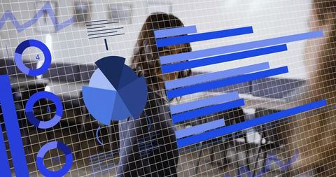 Female Executives Analyzing Interactive Data Dashboard with Blue Charts in Modern Office