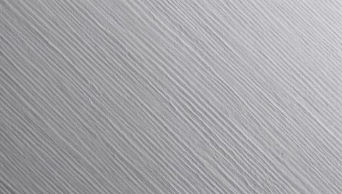 Revealing diagonal textured surface with fine parallel ridges and embossed relief