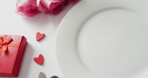 Valentine's Day Dinner Setting with Roses and Gift - Download Free Stock Images Pikwizard.com