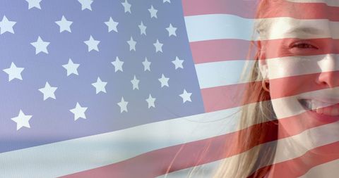 Smiling Woman Overlaid with US Flag Celebrating Patriotism