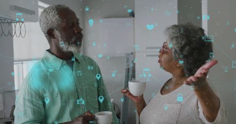 Senior african american couple discussing with virtual connectivity overlay