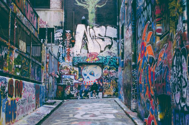 Vibrant Urban Alleyway with Colorful Graffiti Art - Download Free Stock Photos Pikwizard.com