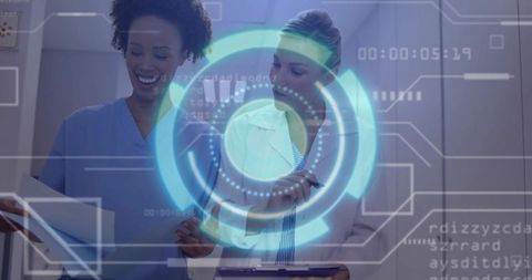 Clinicians reviewing digital patient data with holographic interface in hospital corridor