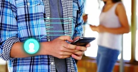 Teen texting on smartphone with digital chat overlay in sunlit cozy wooden lounge