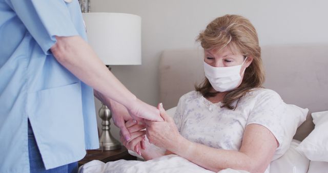 Nurse Comforting Female Patient with Face Mask in Hospital Bed - Download Free Stock Images Pikwizard.com