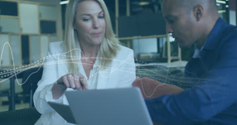 Business Team Analyzing Data with Cybernetic Overlay