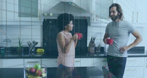 Couple Enjoying Morning Coffee in Modern Kitchen Setting