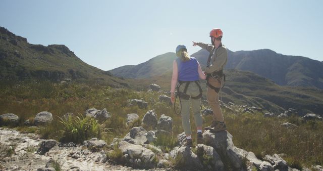 Adventurous Couple Hiking in Mountain Landscape on Sunny Day - Download Free Stock Images Pikwizard.com