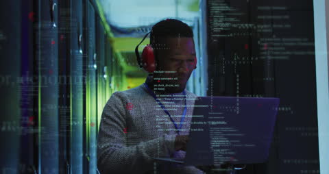 Engineer Analyzing Data with Technology Interface in Server Room