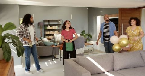 Multiracial Friends Celebrating at Housewarming Party