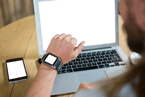 Man Using Smart Watch with Laptop: Transparent Screens Setup - Download Free Stock Videos Pikwizard.com
