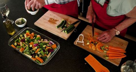 Senior Couple Preparing Vegetables for a Nutritious Home-Cooked Meal