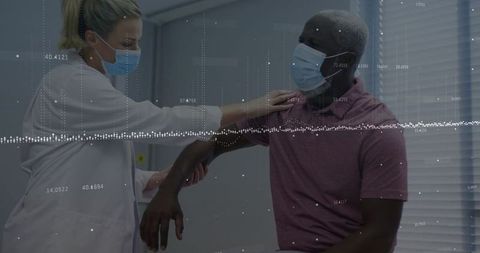 Doctor evaluating patient arm in medical clinic consultation