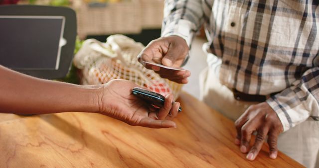 Close-Up of Mobile Contactless Payment at Farmers Market - Download Free Stock Images Pikwizard.com