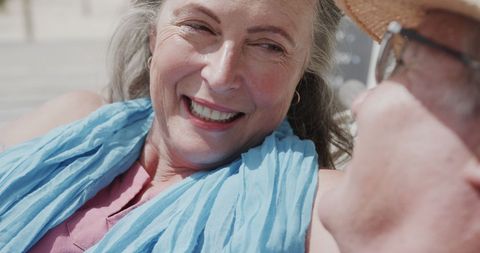 Senior Couple Relaxing Together on Tropical Beach