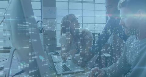 Developers Collaborating on Code in Modern Office with Digital Overlay