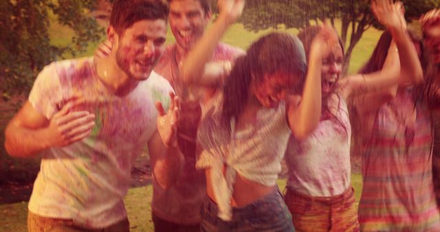 Group of Friends Celebrating with Color Powders Outdoors - Download Free Stock Photos Pikwizard.com