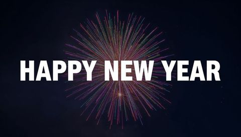 HAPPY NEW YEAR Bold Typography Over Multicolored Firework Burst on Dark Night Sky