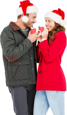 Transparent Joyful Couple with Santa Hats Sharing Hot Chocolate