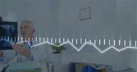 Senior doctor analyzing x-ray with medical graph overlay in examination room