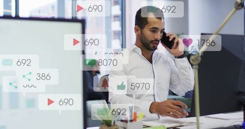 Businessman Engaged in Mobile Call with Social Media Interface