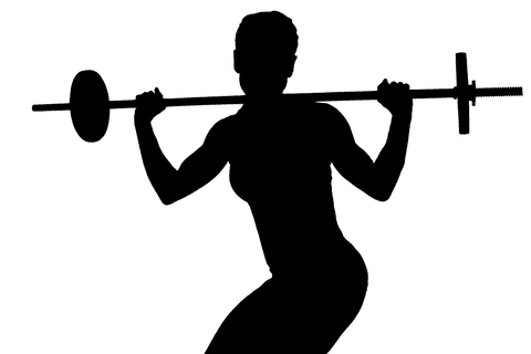 Transparent barbell workout by determined woman athlete