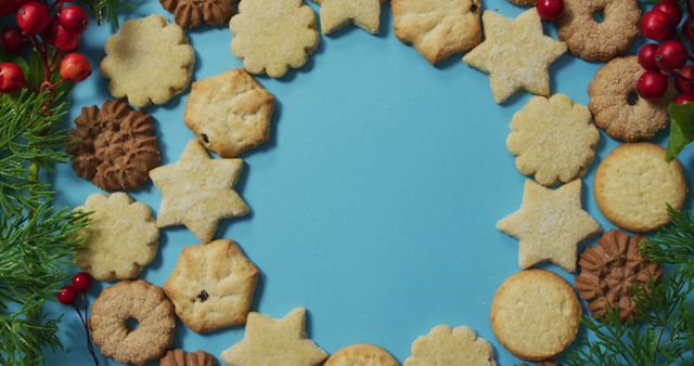 Christmas decorations with cookies and copy space on blue background - Download Free Stock Photos Pikwizard.com