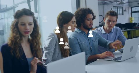Diverse Team Collaborating in Office with Digital Interface - Download Free Stock Images Pikwizard.com