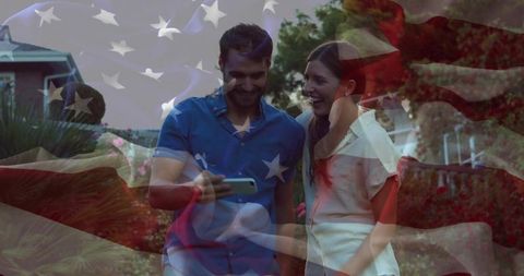 Couple Enjoying Mobile Content during Outdoor Walk, American Vibes