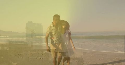 Sunlit double-exposure black couple walking beach with city skyline overlay at golden hour