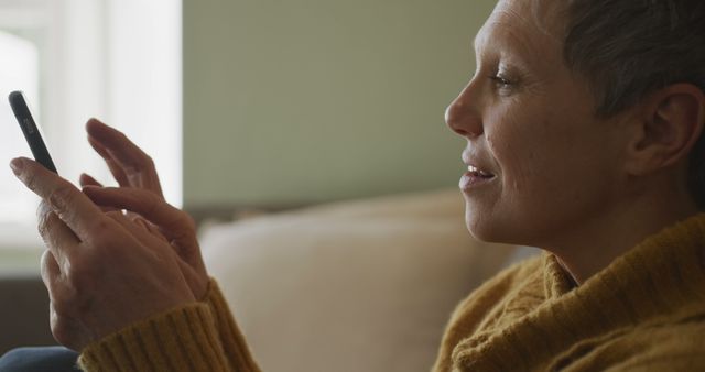 Senior Woman Typing on Smartphone at Home - Download Free Stock Images Pikwizard.com