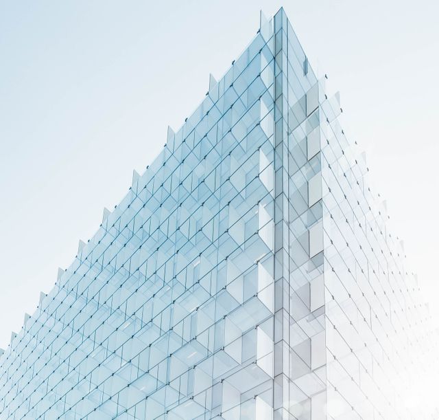 Modern Glass Building with Reflective Facade - Download Free Stock Photos Pikwizard.com