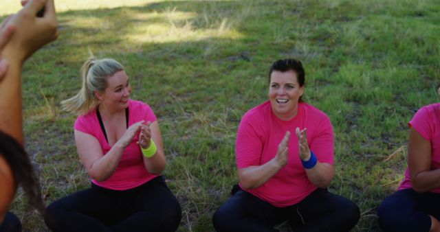 Group of Women Clapping Outdoors in Pink Shirts - Download Free Stock Images Pikwizard.com