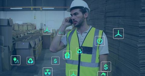Warehouse supervisor inspecting boxes with smartphone and digital sustainability icons