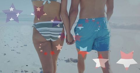 Holding hands walking toward ocean on sunny beach with decorative star overlay