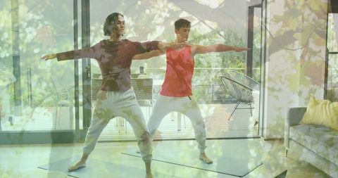 Couple Practicing Yoga at Home with Autumn Tree Overlay