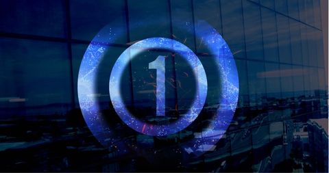 Digital blue countdown overlay on modern glass structure