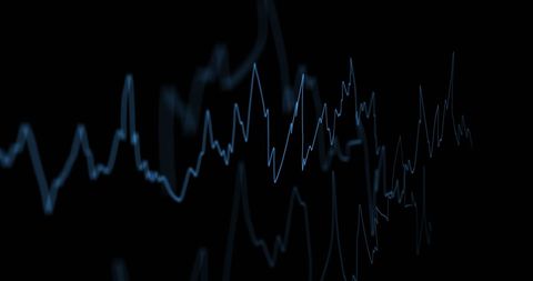 Dynamic Financial Data on Black Background Evoking Market Trends
