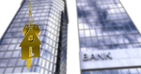 House Key Dangle Over Bank Buildings Symbolizes Financial Options