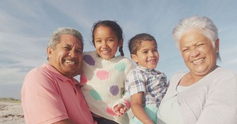 Multigenerational Family Enjoying Beach Environment Together
