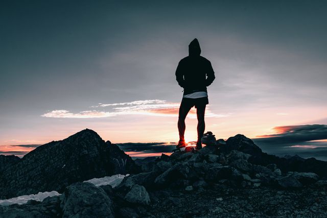 Man Standing on Mountain Peak at Sunrise - Download Free Stock Photos Pikwizard.com