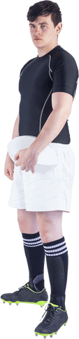 Transparent rugby player with rugby ball standing confidently