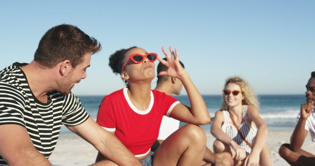 Group of Friends Enjoying Summer Beach Outing in Relaxed Atmosphere - Download Free Stock Images Pikwizard.com